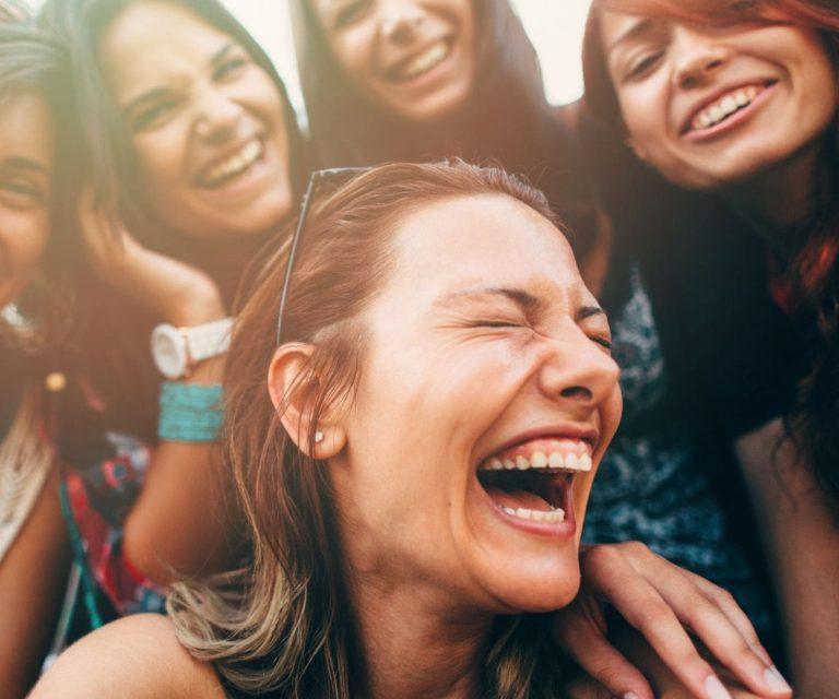 A happy woman with friends in Rome