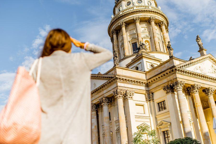 A woman admiring the Berlin Cathedral during her weekend break to Berlin