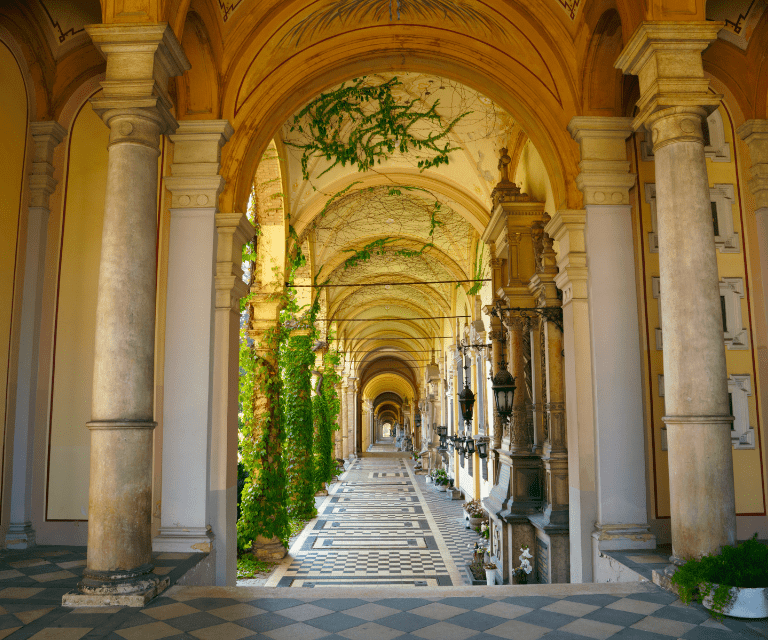 Magnificent entrance to Morogoj with stunning columns with ivy climbing around them, one of the must-see sights during a Zagreb city break