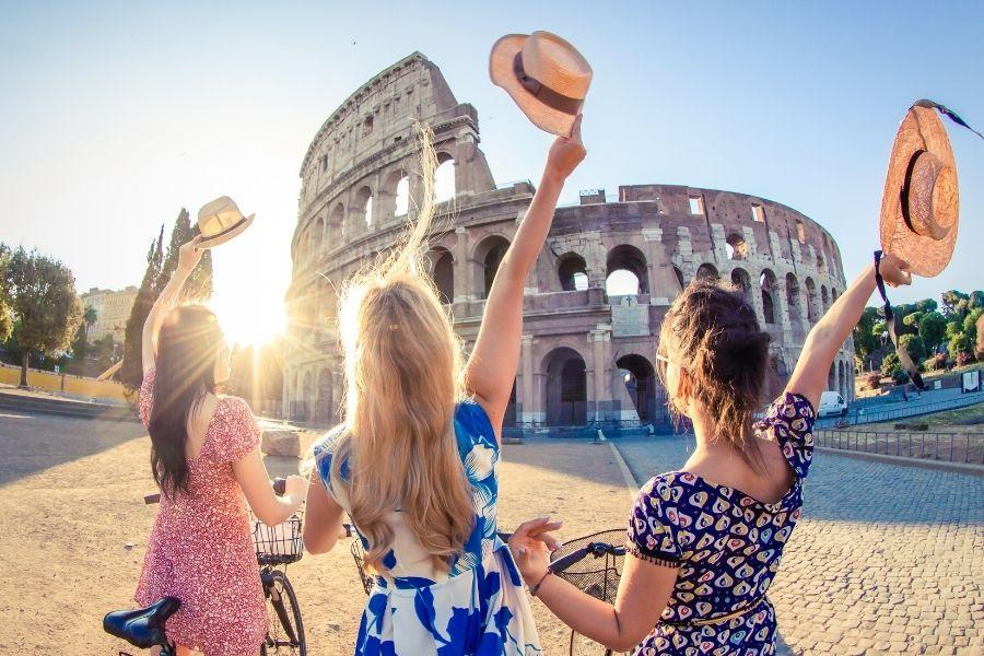 3 women near Colloseum on their long weekend break to Rome
