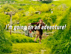 A gif of Bilbo Baggins from Hobbit. He is running towards the camera holding a map. A white inscription says: "I'm going on adventure".