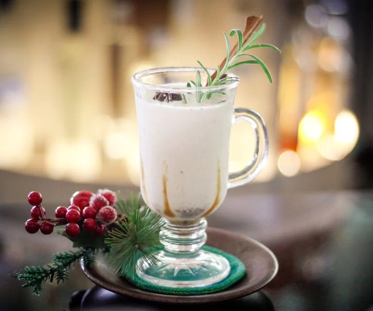 Traditional eggnog, beautifully decorated with cinnamon and anise stars