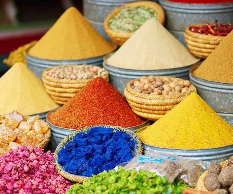 Colorful spices on a authentic moroccan market, a must-visit place during a Morocco getaway