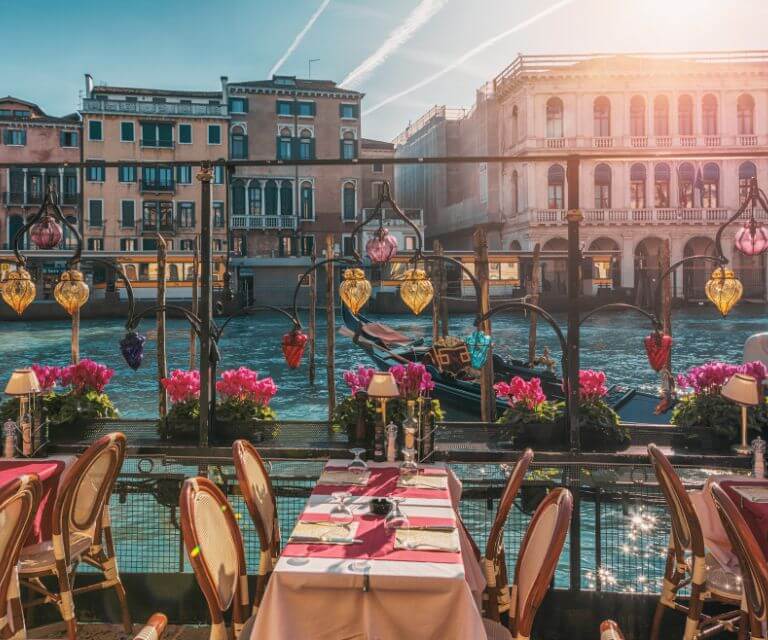 A restaurant in Venice offering beautiful views over the canals, a great place to check out during the Venice weekend break