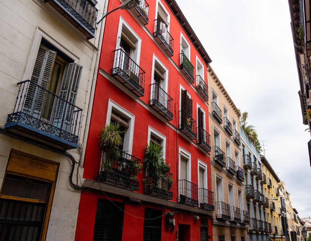 Colorful houses of the Malasana district, a great place to visit on a family getaway to Madrid