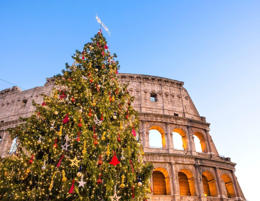 A beautiful Christmas tree near the Colosseum, a must-see sight during a Christmas getaway to Rome