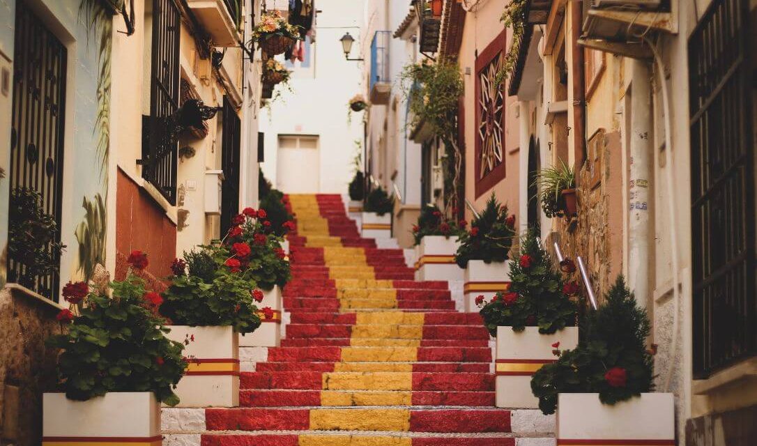Beautiful stairs in Alicante painted in the national colors of Spain, a must-see sight during a weekend break to Spain